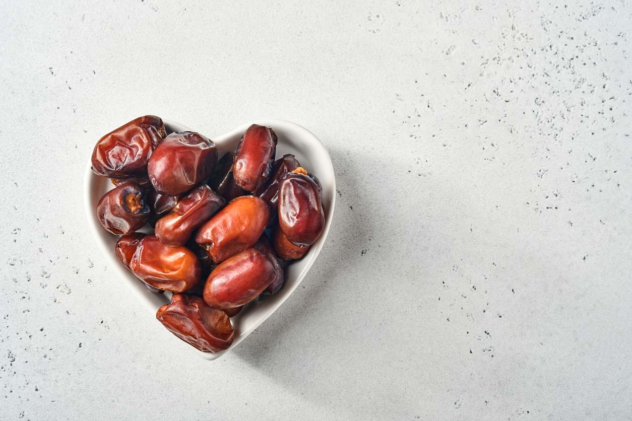 dates in heart shaped bowl