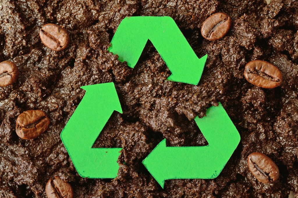 Recycling symbol on coffee grounds