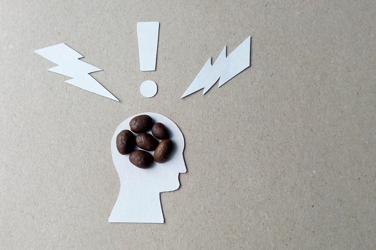 The effects of caffeine on the brain image from coffee beans, cardboard and white paper
