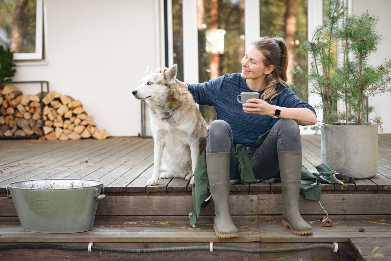 woman working in the garden ( house, dog, resting)