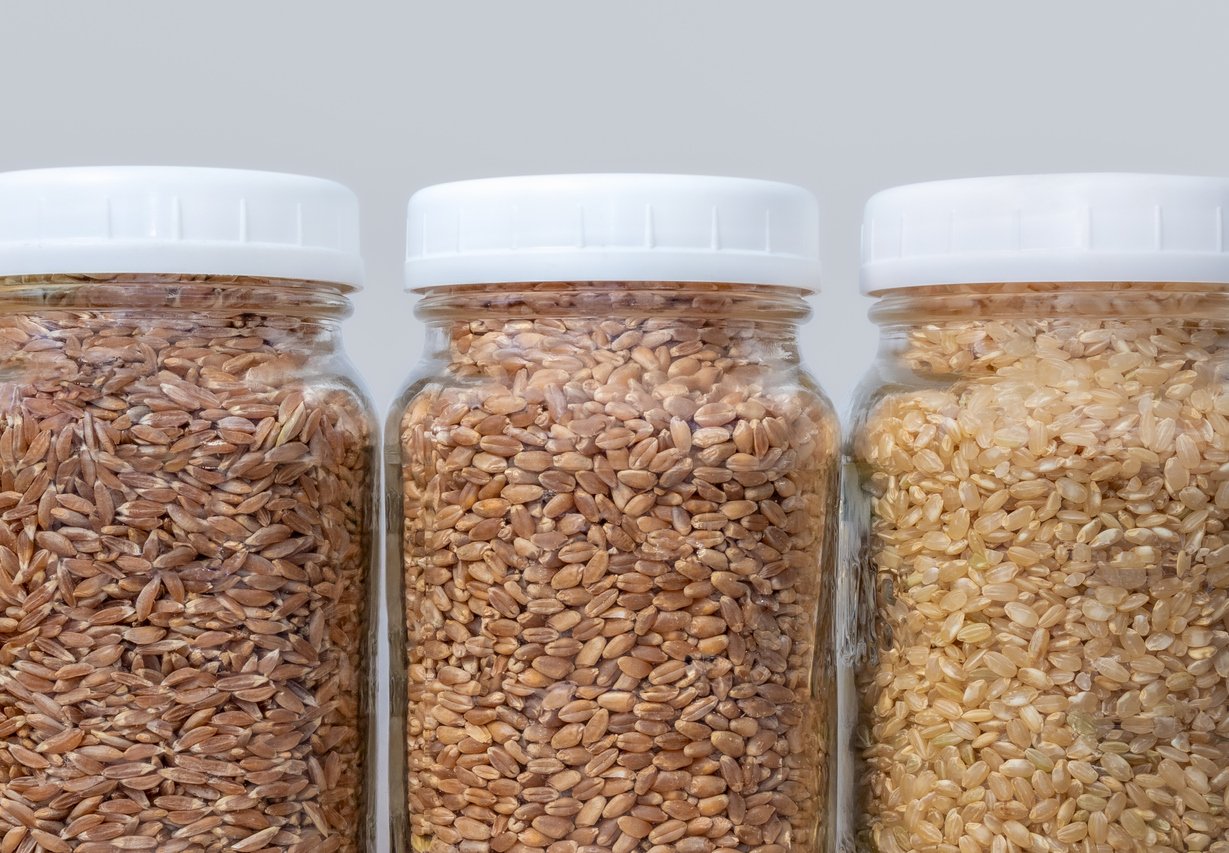 Close up of mason jars filled with grains.