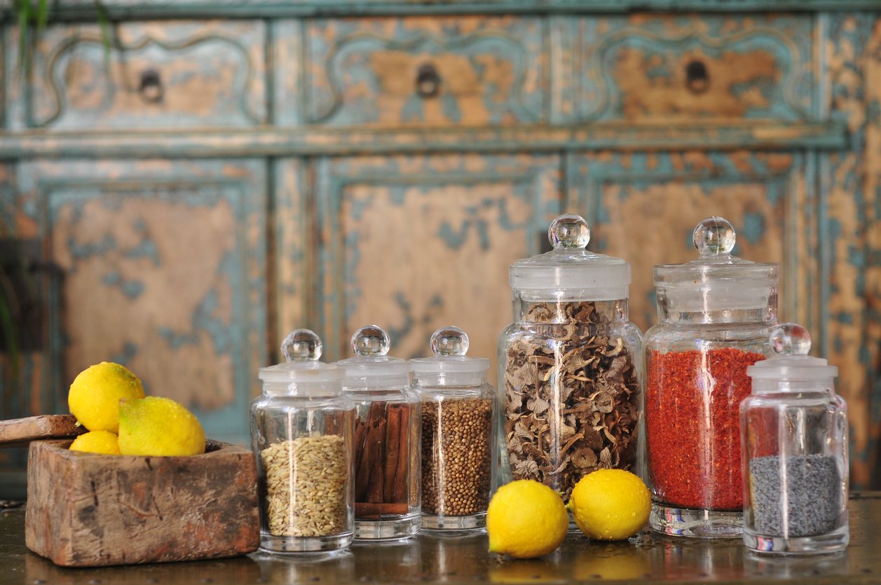 Seeds in jars and lemon in kitchen