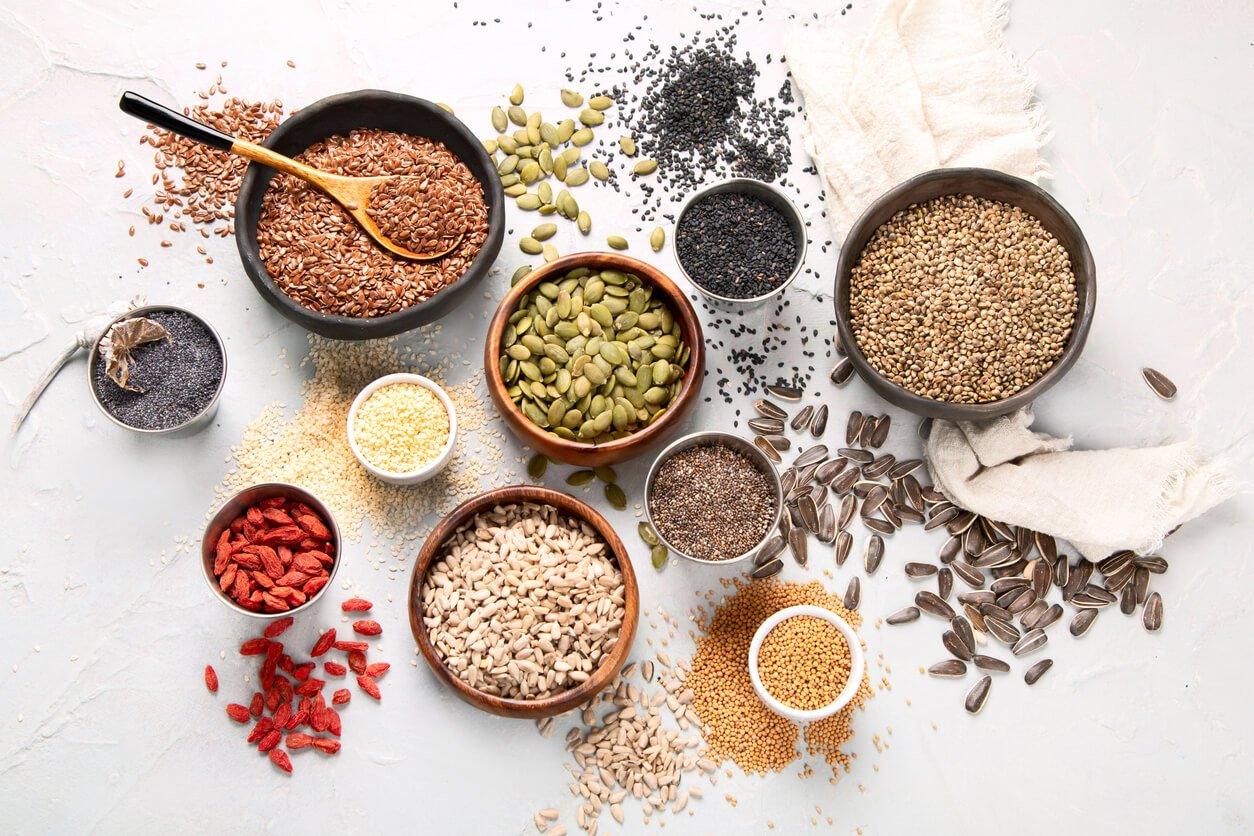 variety of edible seeds on light background 