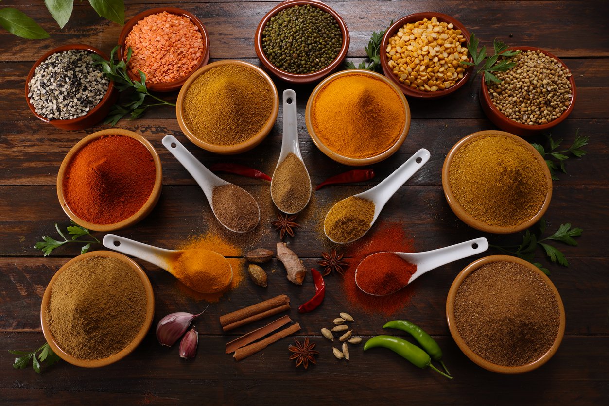 A selection of herbs and spices including Red and Green Chilli Turmeric Cumin Garam Masala making for savory cuisine