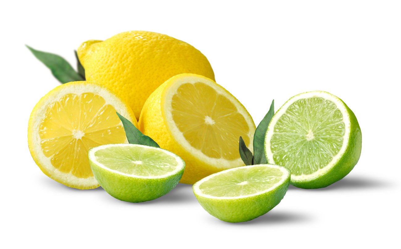 Fresh lemons and limes on a white background