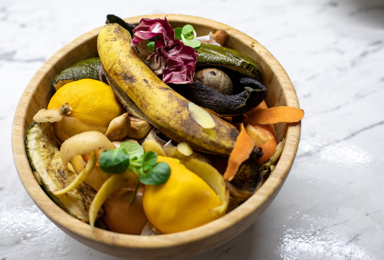 Biodegradable food leftovers in a bowl, ready to be composted