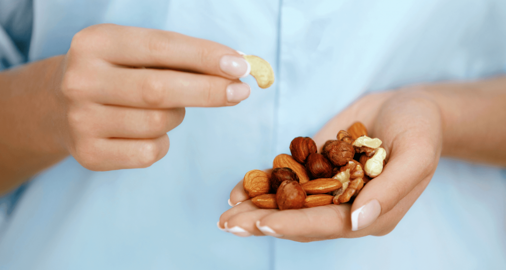 Woman's hands with nuts