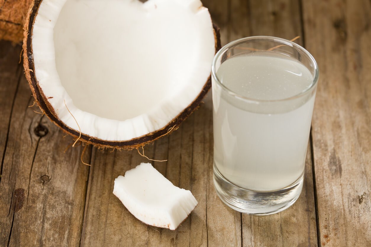 Coconut Water and coconut on table