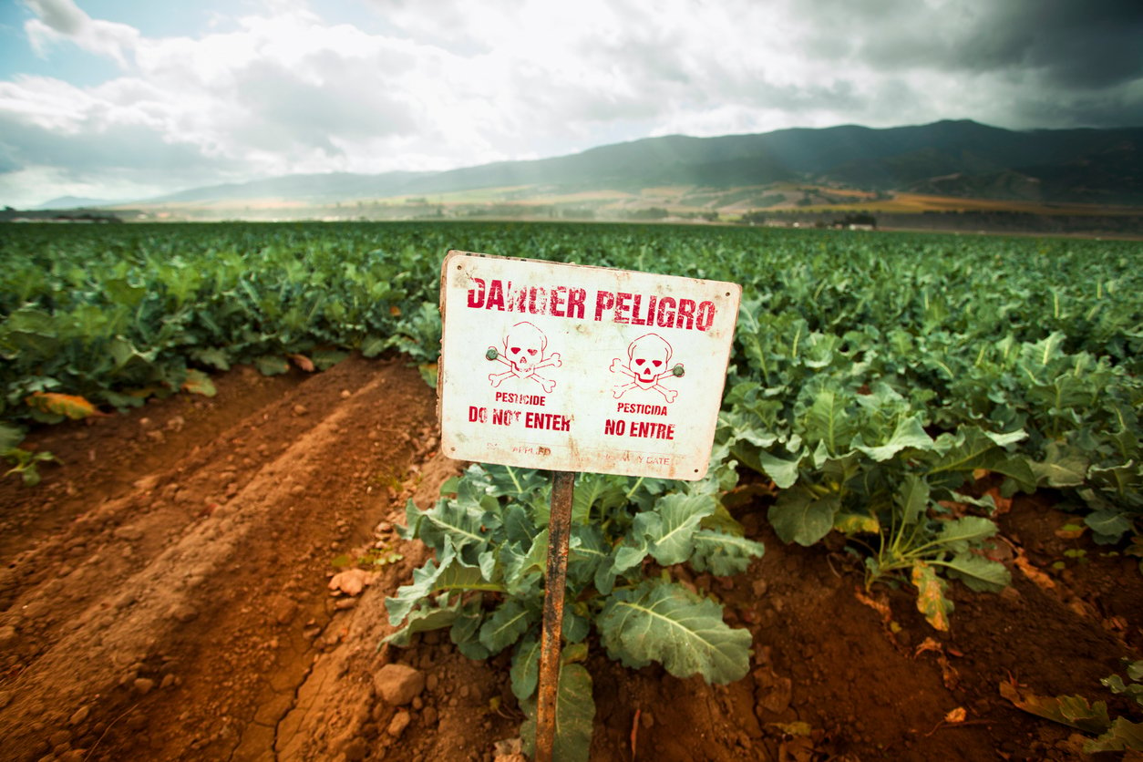 Poison pest control chemicals sprayed on a field in the Salinas Valley, California USA