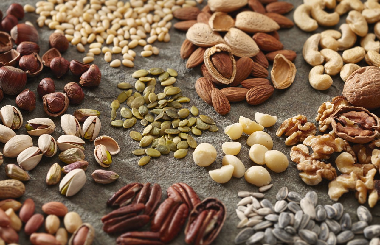 Various piles of nuts and seeds