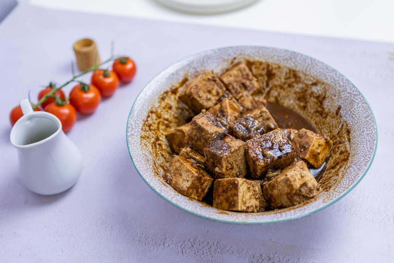 Marinated tofu ready for baking or frying.