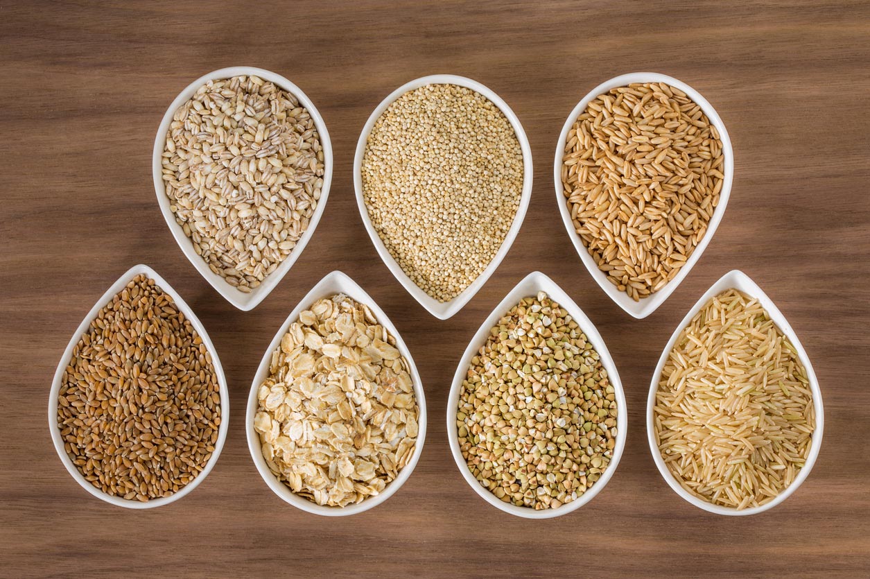 variety of whole grains in bowls