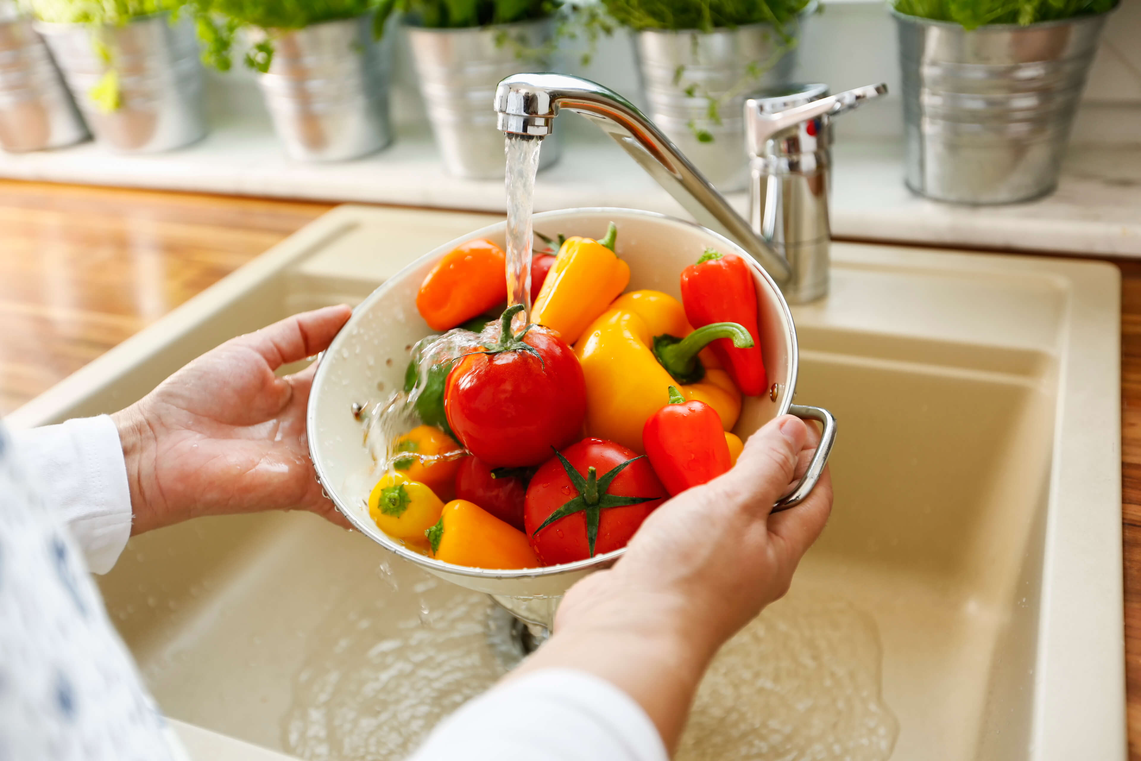 Running vegetables under water