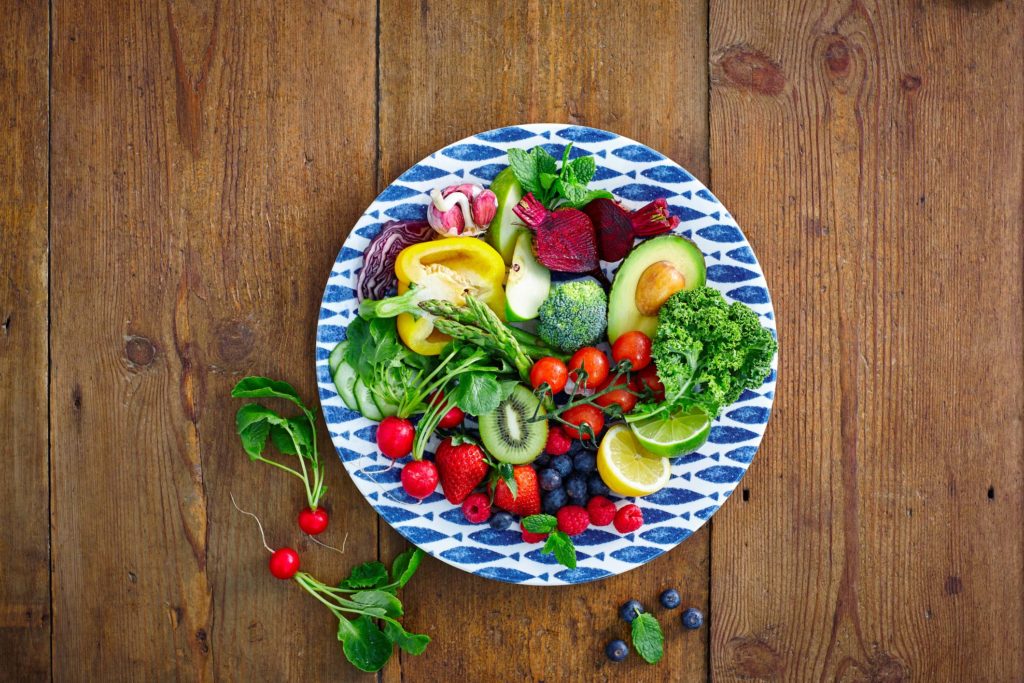 Raw foods recipe bowl with fruits and veggies