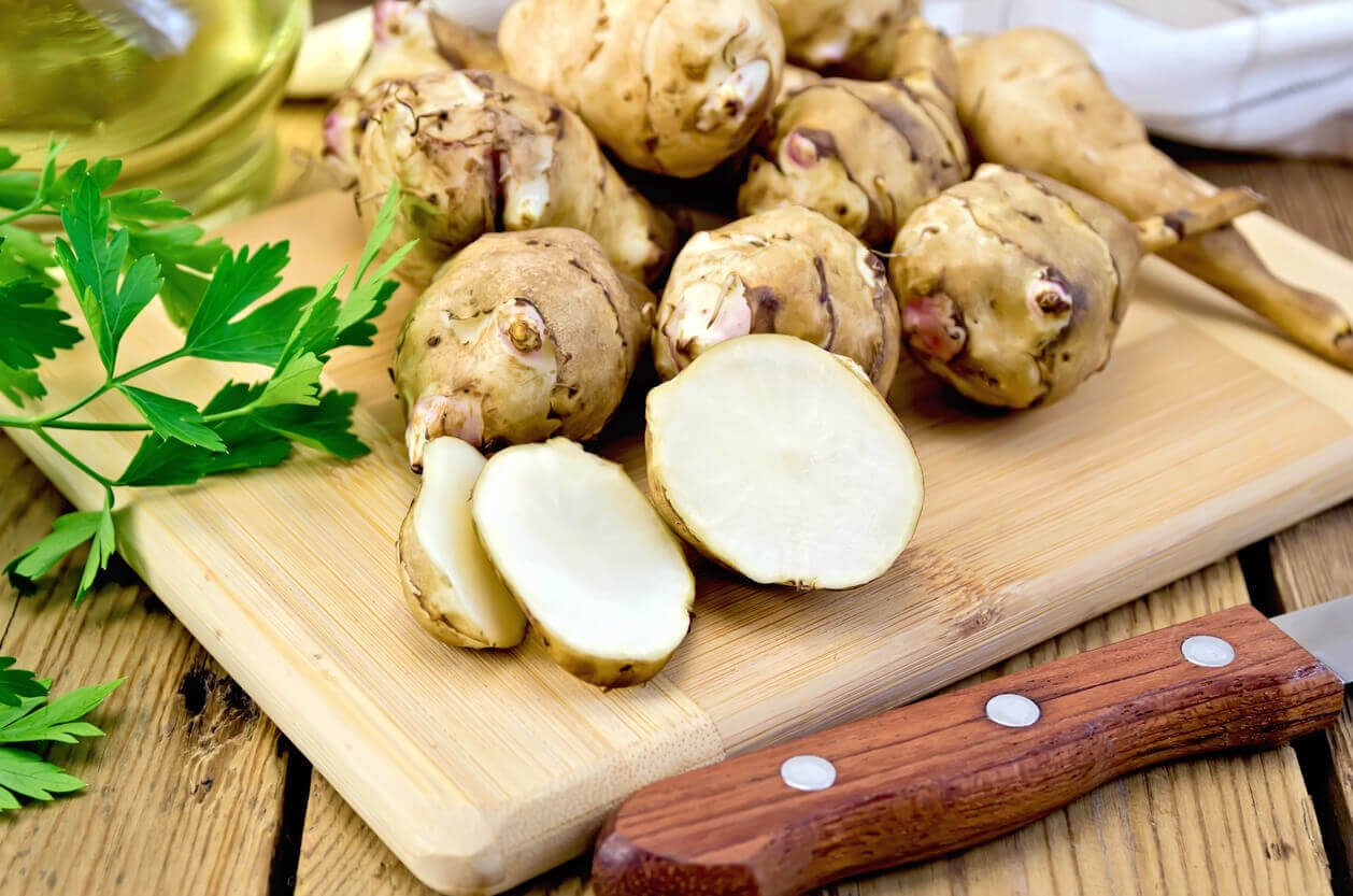 Jerusalem Artichoke sliced with knife