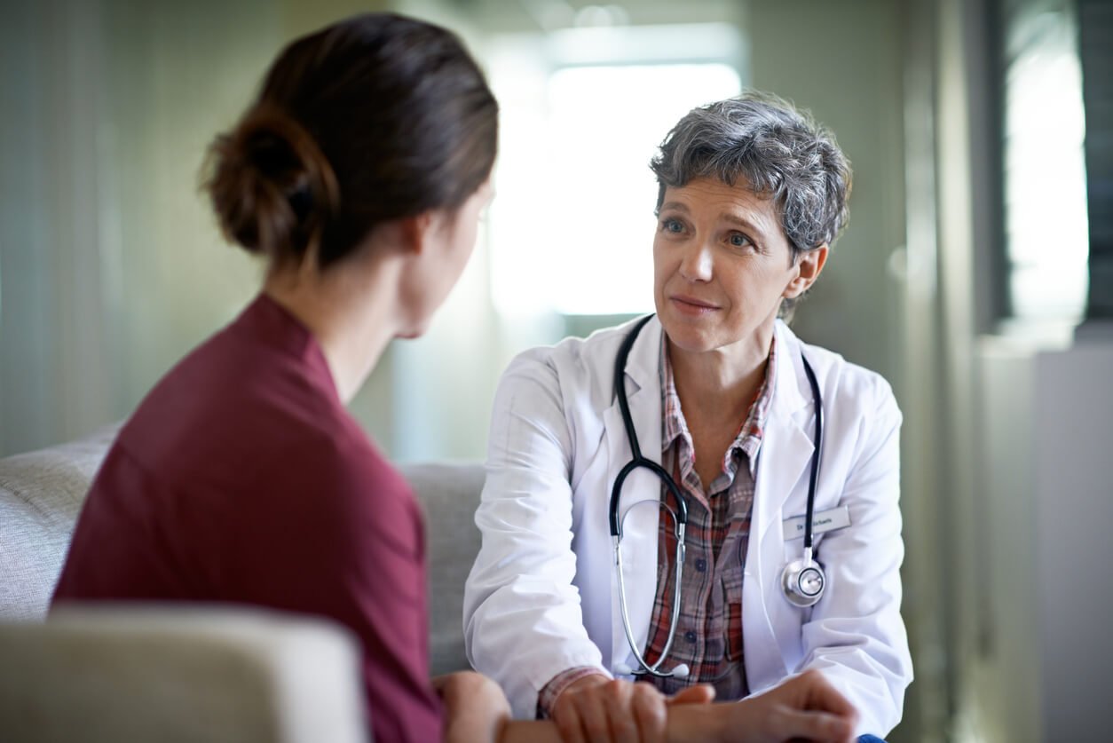 doctor discussing lifestyle disease prevention with her patient