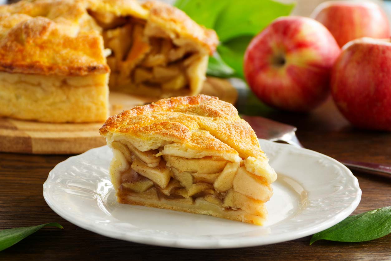 classic american apple pie slice on plate