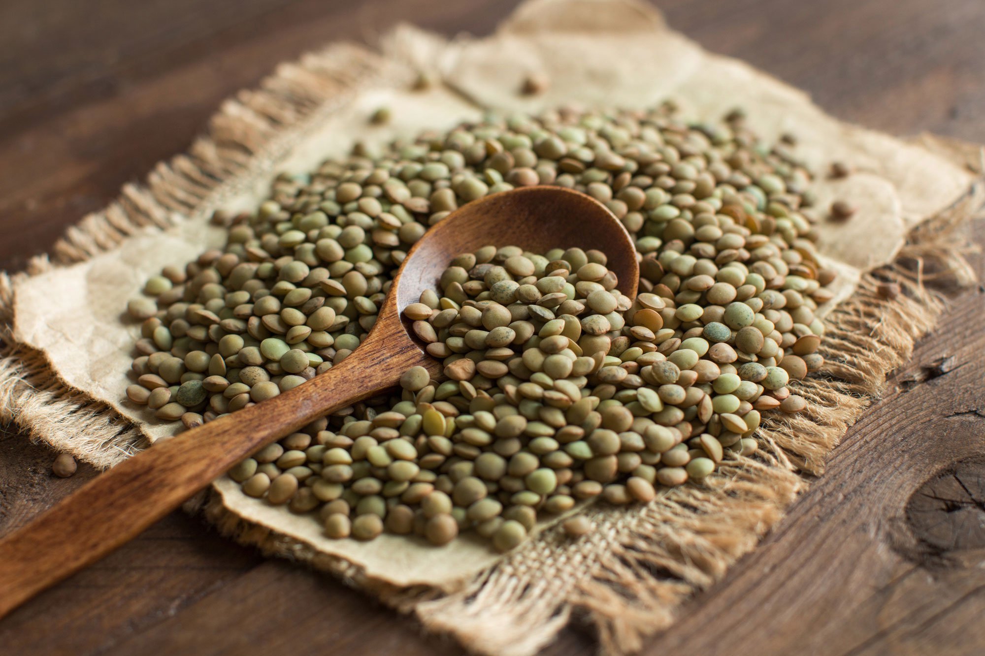 lentils with a wooden spoon