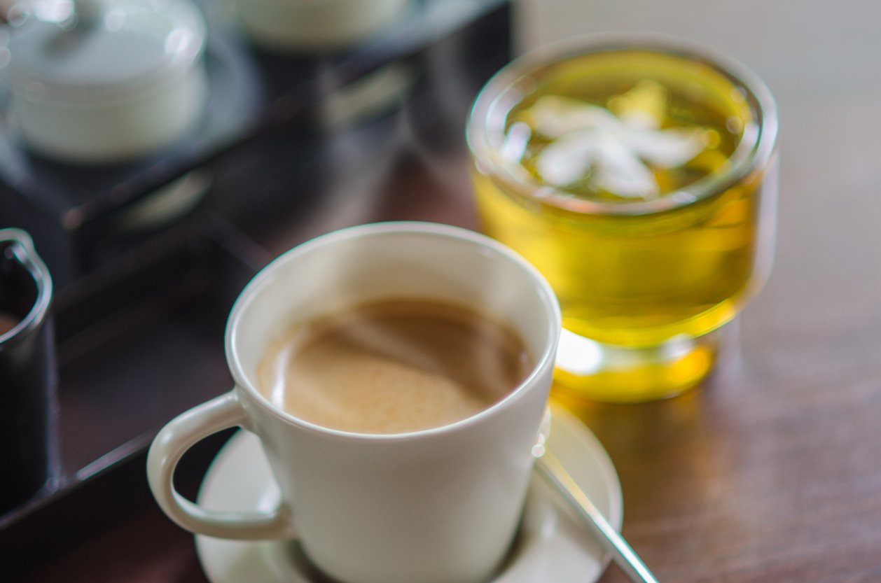 Coffee Cup and Green tea On Table