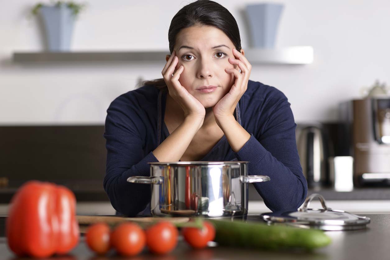 unmotivated woman not preparing dinner
