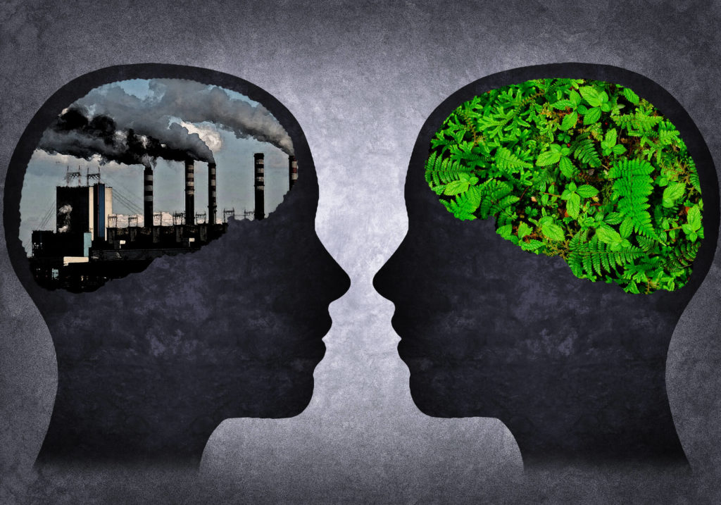 Concept image of two heads with brains filled with air pollution and greenery