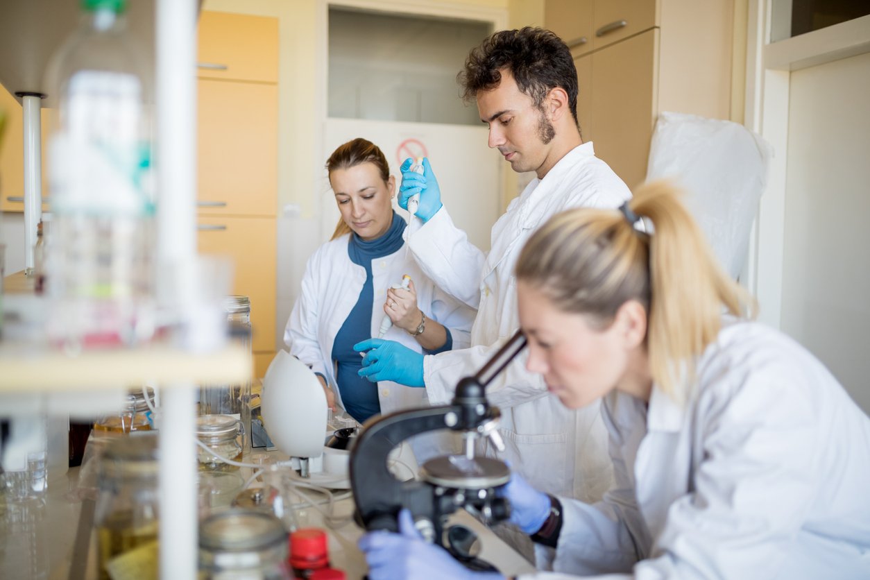 Scientists working on natural flavors in a lab