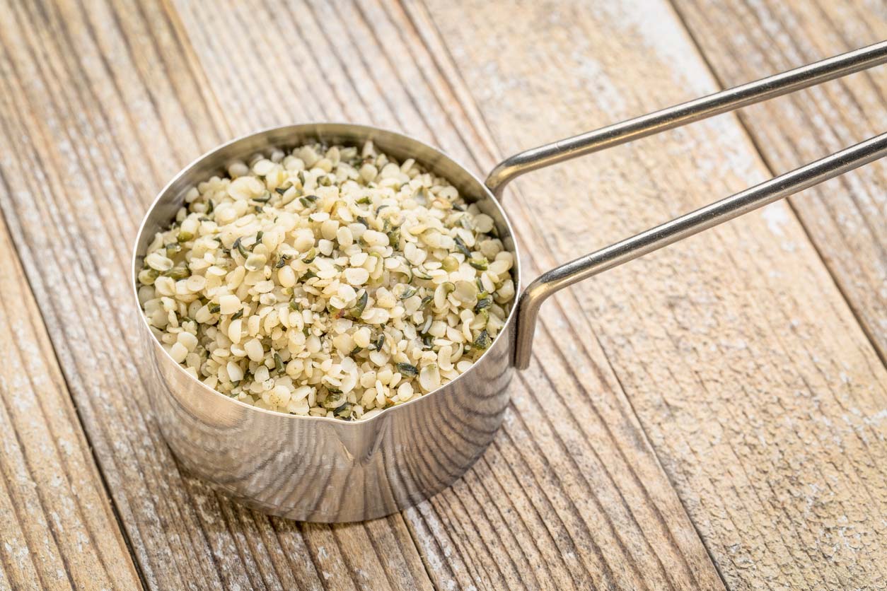 Hemp seeds in measuring cup