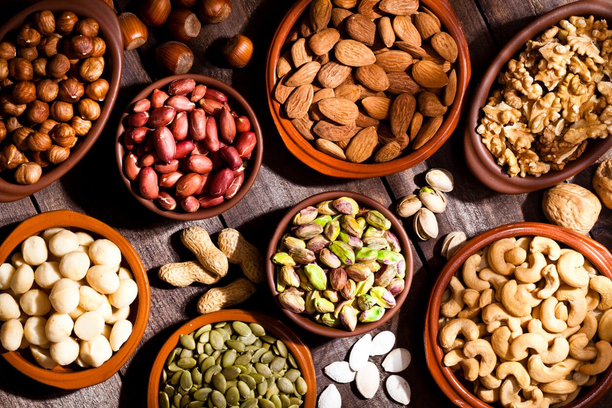 nut assortment on rustic wood table