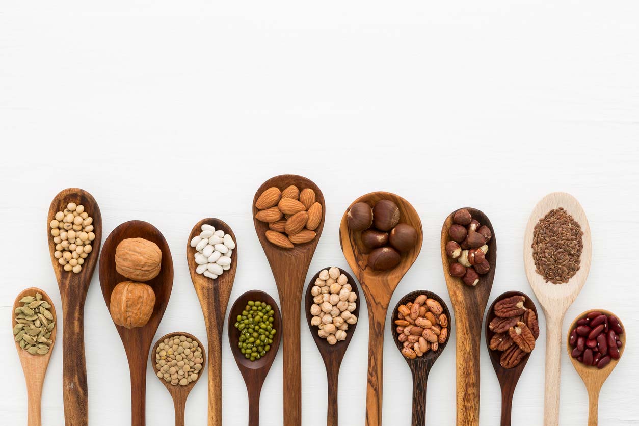 Plant-based protein sources for vegan bone health in wooden spoons