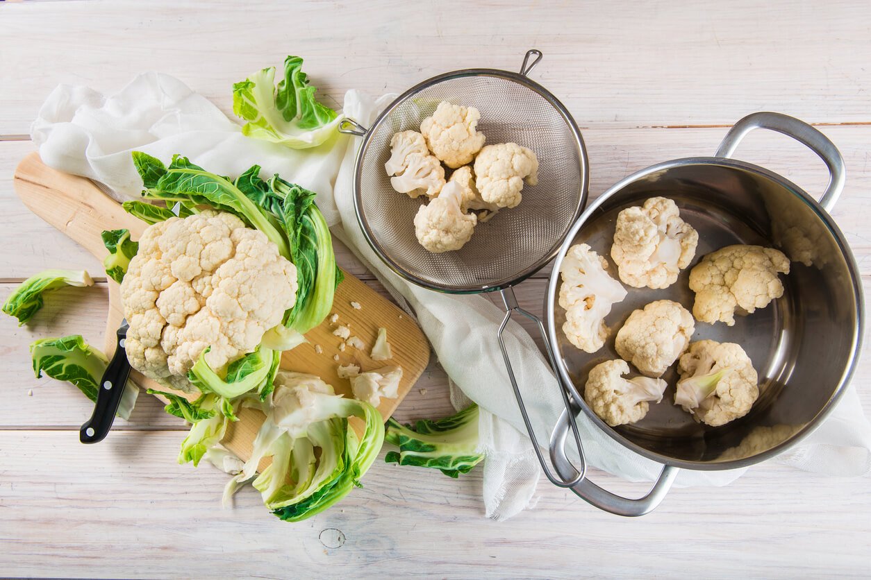 raw cauliflower on the table of the kitchen