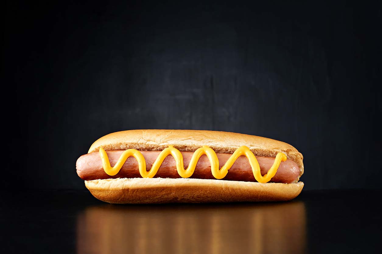 hot dog with mustard