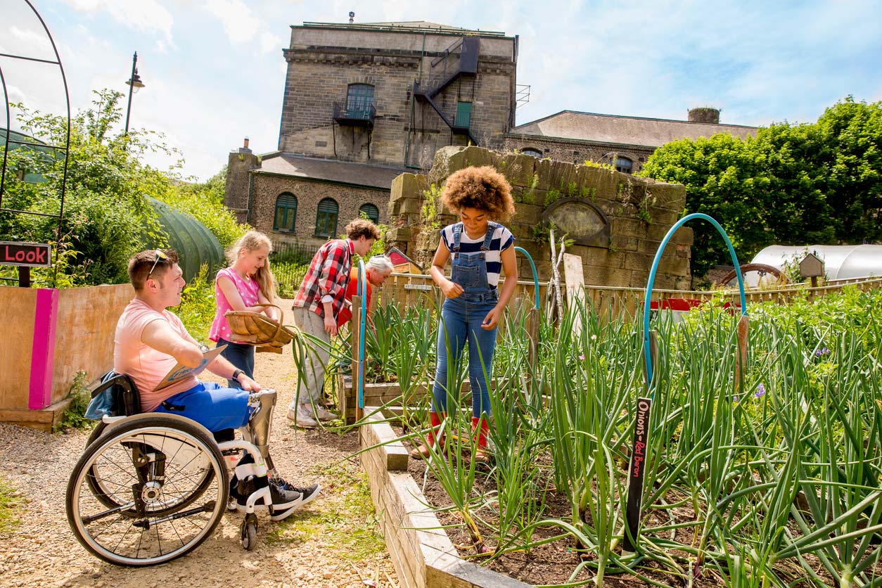 group of young people gardening at the farm