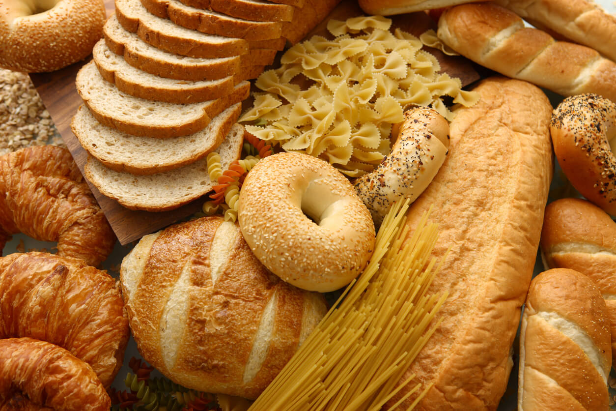 full background of many different types of bread products