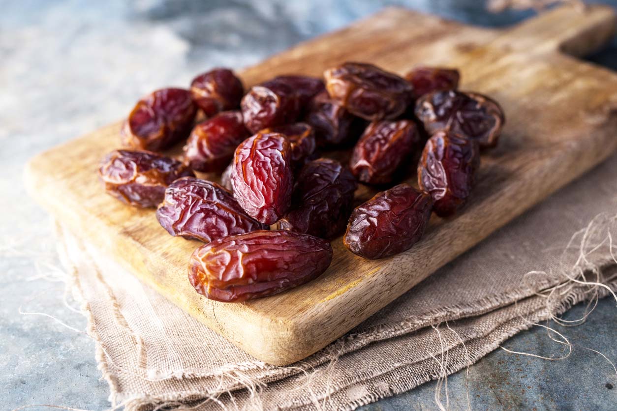 Dates on cutting board - The top vegan substitution for sugar