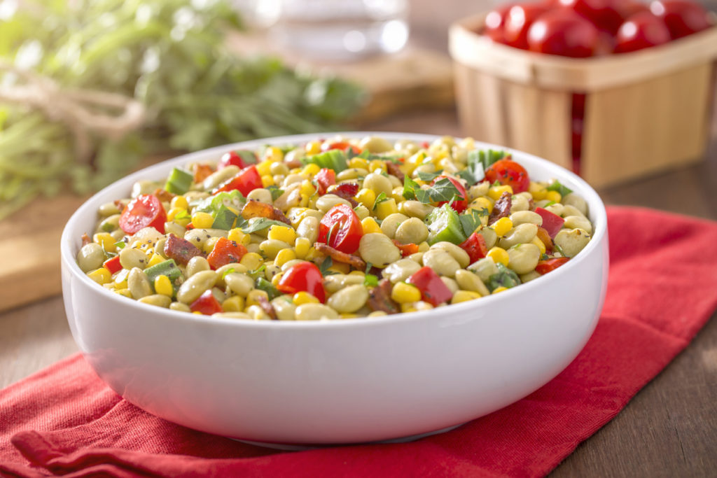 Southern succotash with corn, lima beans, okra, tomatoes, and squash.