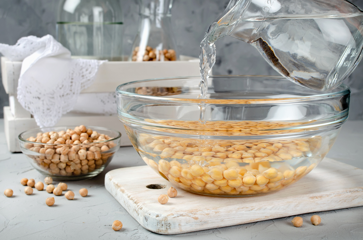 Chickpea soaked in water in a glass bowl