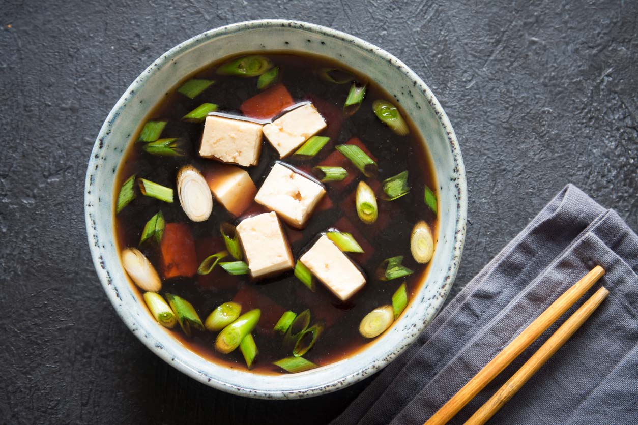 Miso soup with tofu in bowl