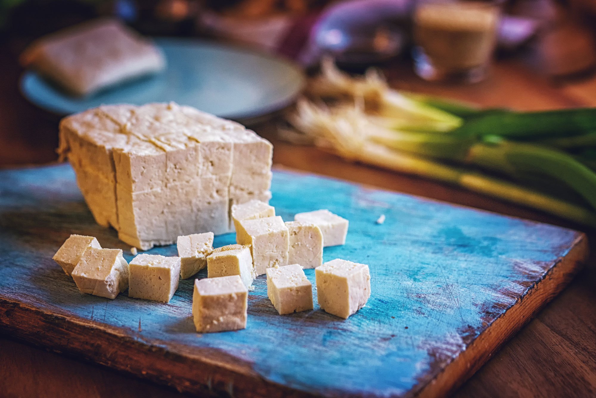 cut tofu on a cutting board