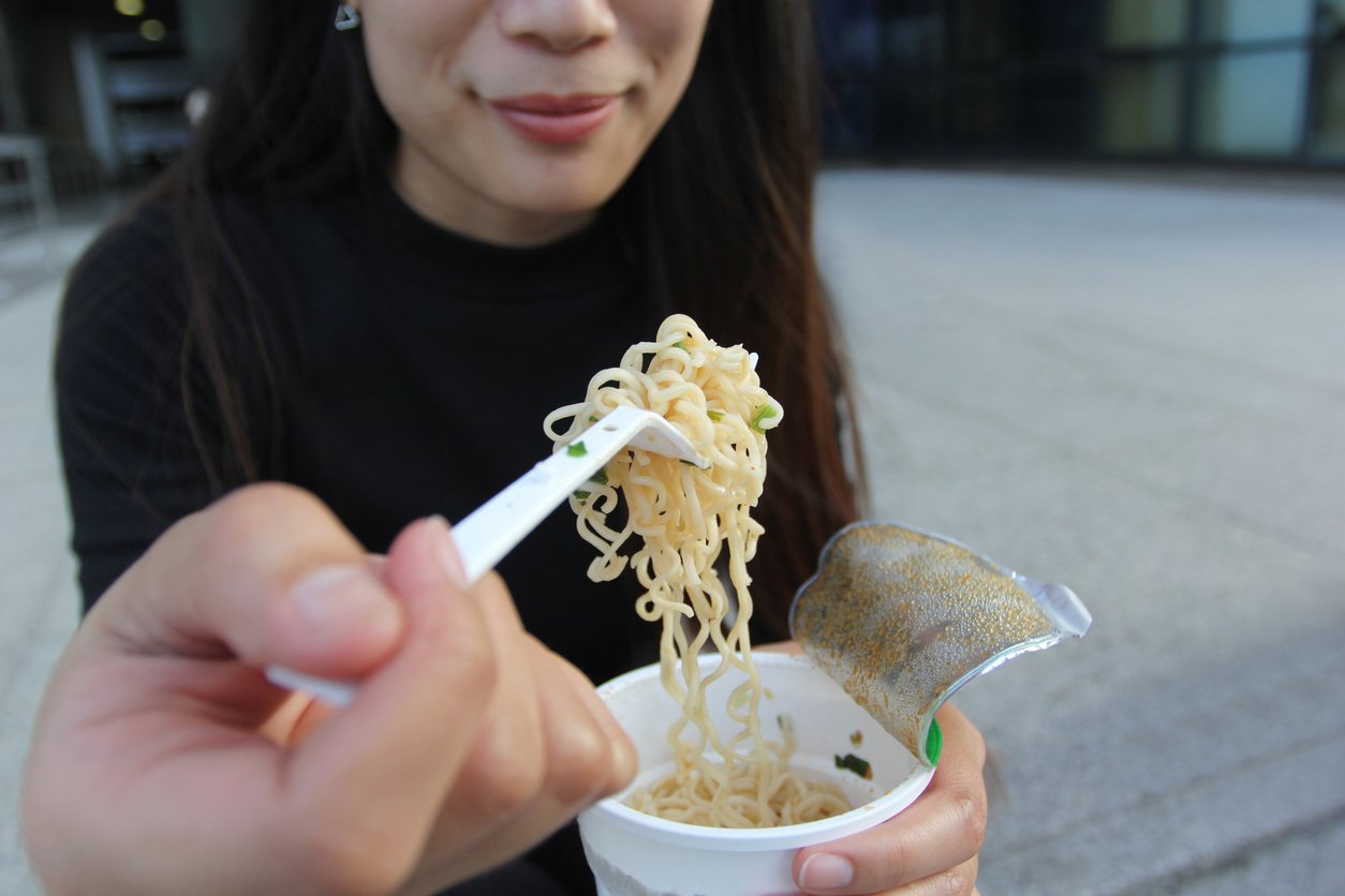 is ramen healthy? woman with instant ramen