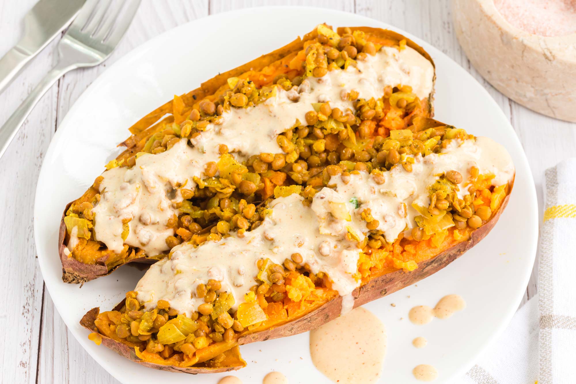 lentil stuffed sweet potatoes on plate