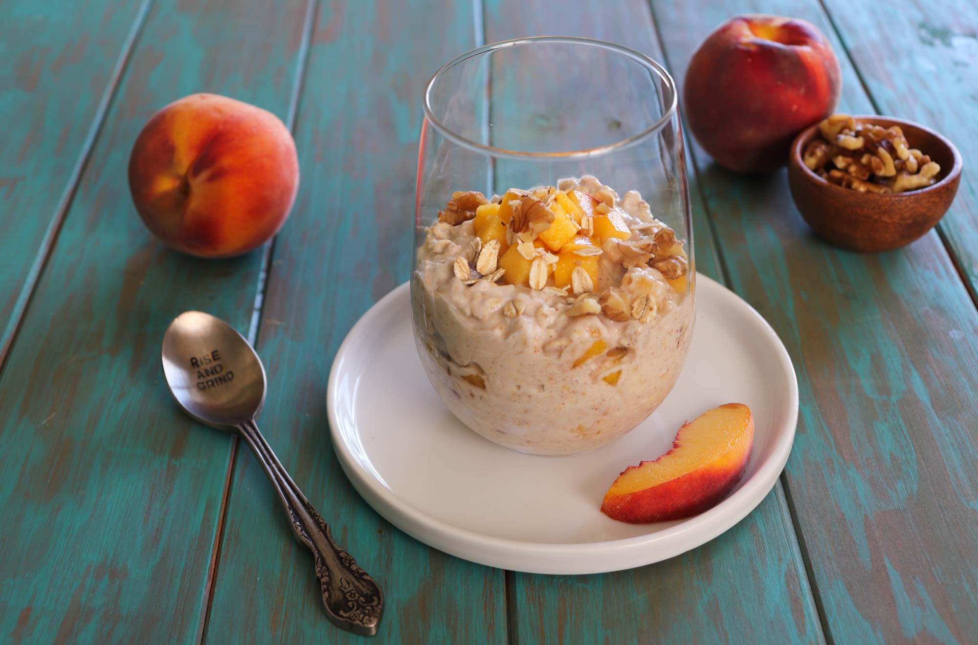 peaches and cream overnight oats in glass