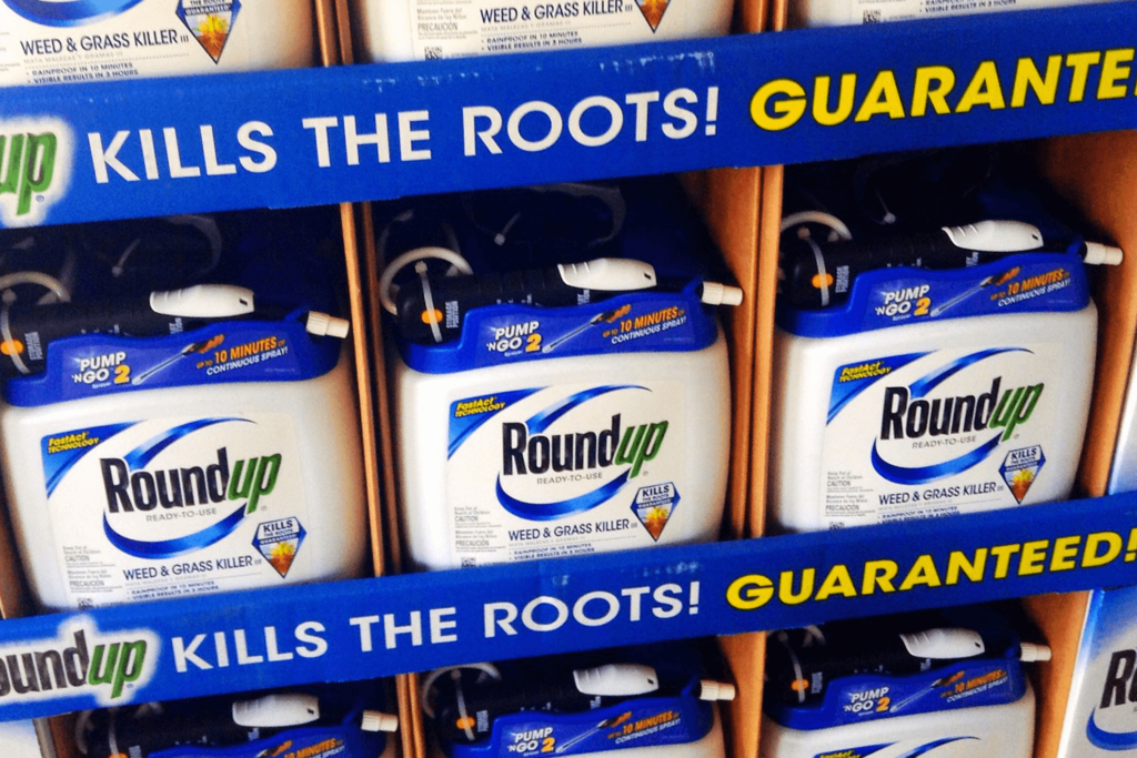 Roundup pesticide featured in a grocery store aisle