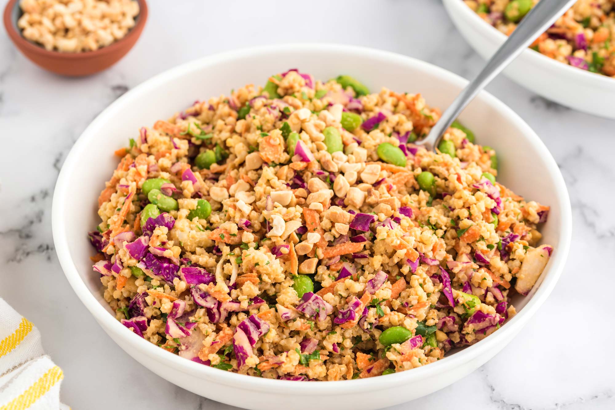 thai millet and peanut salad in bowl