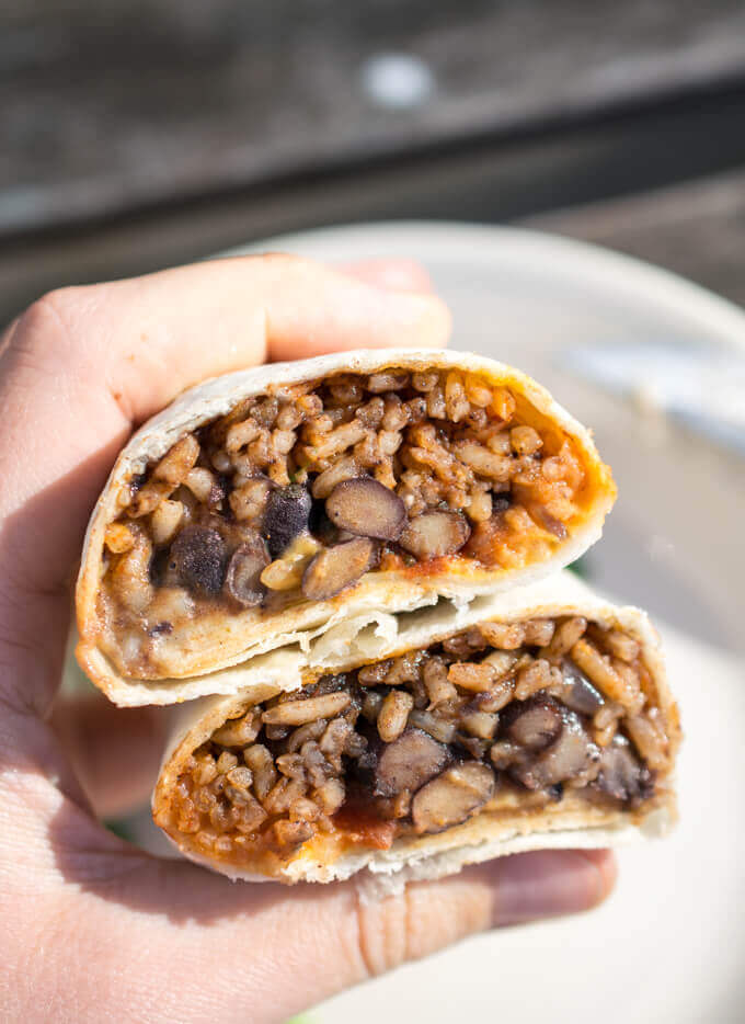 vegan burritos with cauliflower queso and black beans